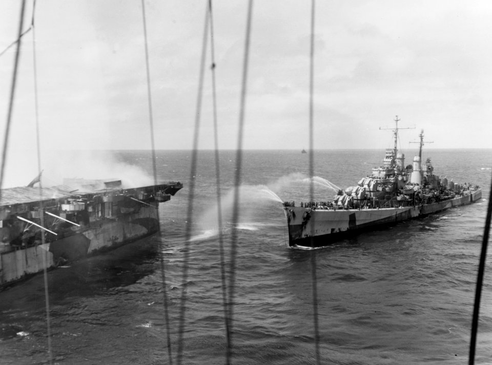 USS Reno (CL-96) coming alongside of USS Princeton (CVL-23) on 24 October 1944