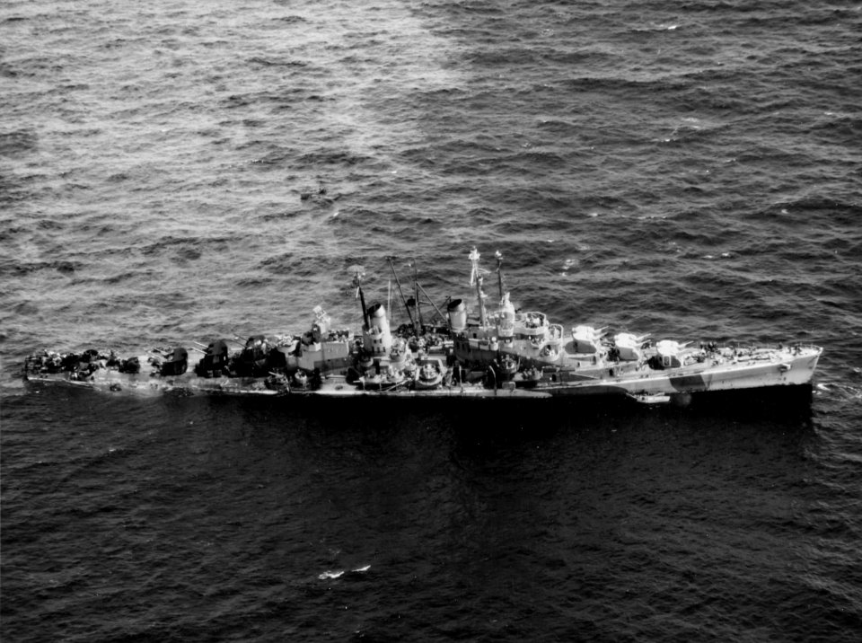 USS Reno (CL-96) under salvage after being torpedoed off the Philippines, 5 November 1944 (NH 63431)