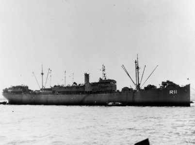 USS Rigel (AR-11) at anchor, circa in 1945-1946 (NH 83854)