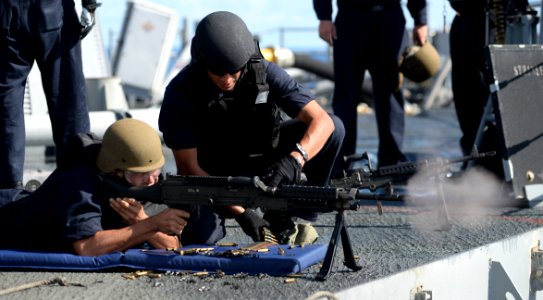 USS Rodney M. Davis conducts live-fire exercises 141001-N-TW634-653