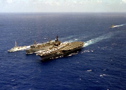 USS Roanoke (AOR-7) refueling Ranger (CV-61) and HMCS Terra Nova (DDE 259) 1986