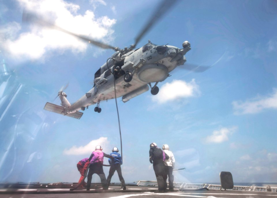 USS Rodney M. Davis flight deck operations with HSM-51 140916-N-TW634-411