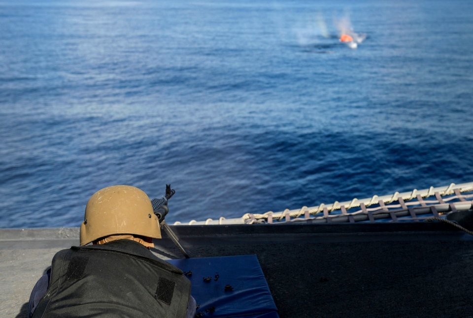 USS Rodney M. Davis conducts live-fire exercises 141001-N-TW634-694