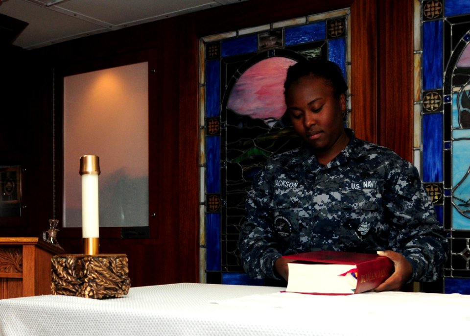 USS Ronald Reagan sailor prepares for mass 130701-N-TO979-006