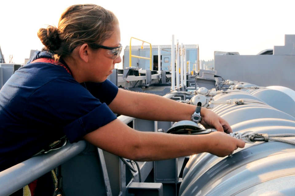 USS Ronald Reagan sailor inspects rafts 120924-N-HF270-002