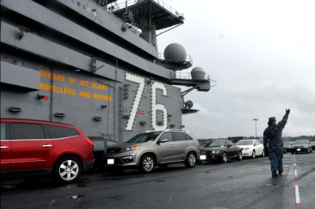 USS Ronald Reagan transports Sailor's cars during a port change. (8559262699)