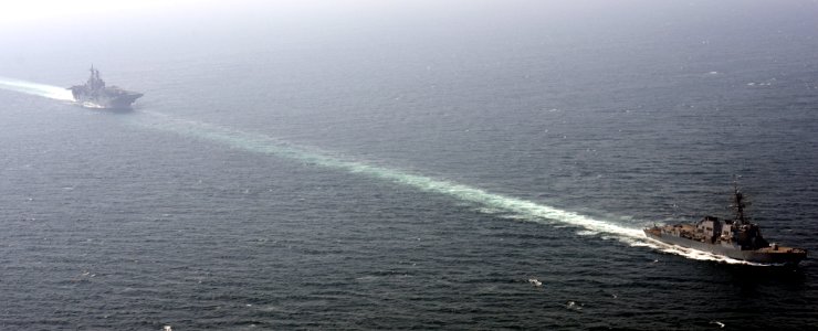 USS Roosevelt escorts USS Bataan through the Strait of Hormuz 140922-N-YC845-061