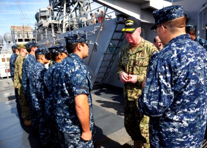USS Rushmore visit 121225-N-YQ852-046