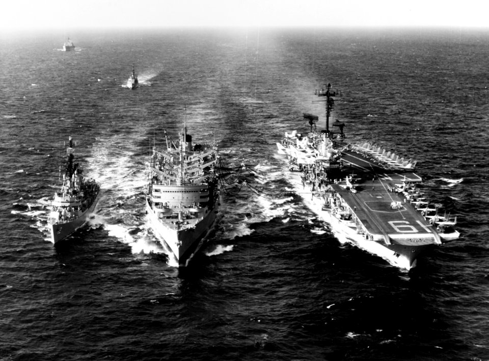 USS Sacramento (AOE-1) refuels USS Hancock (CV-19) and USS Robison (DDG-12) in the Western Pacific on 10 January 1965 (USN 1109945)