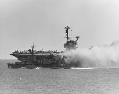 USS Rupertus (DD-851) stands by to assist the burning USS Forrestal (CVA-59), 29 July 1967 (USN 1124775)