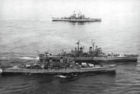 USS Saint Paul (CA-73), USS Bremerton (CA-130) and USS Manchester (CL-83) underway off Korea, in 1953