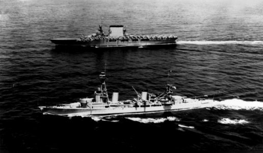 USS Salt Lake City (CA-25) steams past USS Lexington (CV-2) in May 1930
