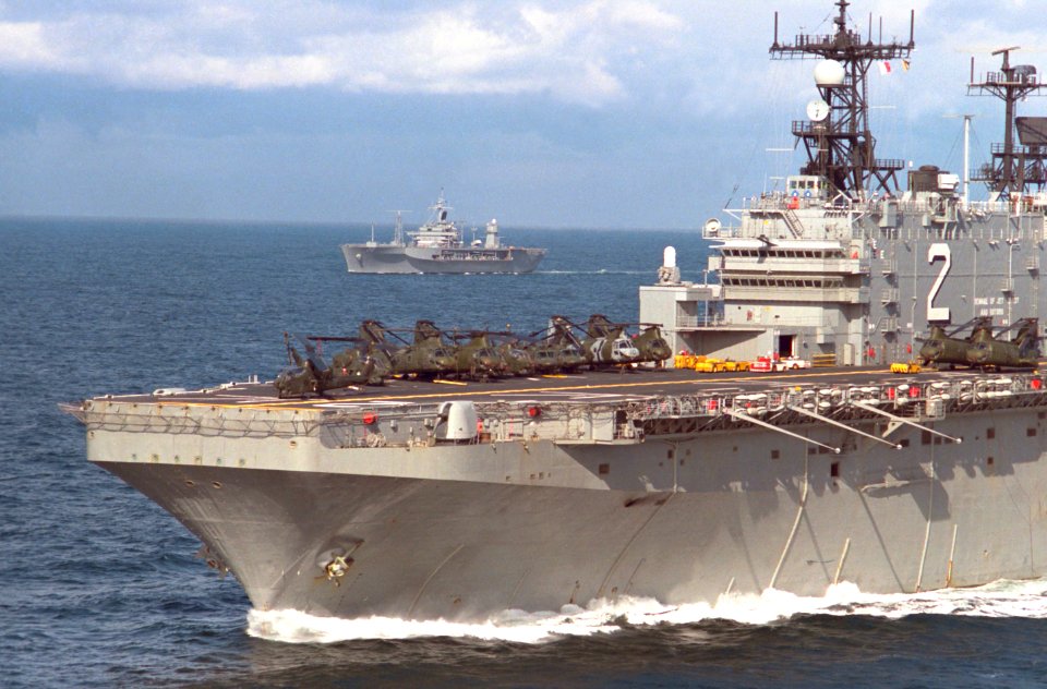 USS Saipan (LHA-2) and USS Mount Whitney (LCC-20) underway in the North Atlantic on 17 September 1986