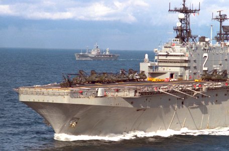USS Saipan (LHA-2) and USS Mount Whitney (LCC-20) underway in the North Atlantic on 17 September 1986