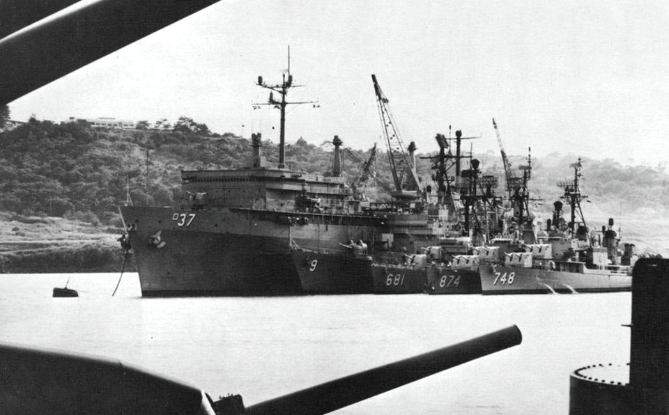 USS Samuel Gompers (AD-37) at anchor with destroyers alongside, circa in 1968