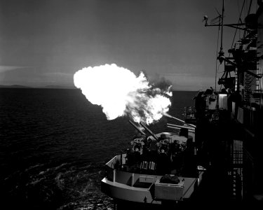 USS Saint Paul (CA-73) shelling Korea 1953 photo