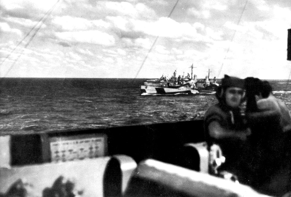 USS San Diego (CL-53) underway with battleships off Iwo Jima in February 1945
