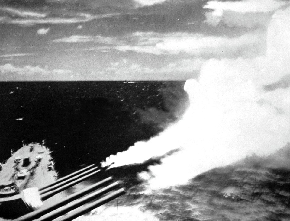USS San Francisco (CA-38) firing her forward turrets, circa in 1943