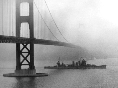 USS San Francisco (CA-38) steams under the Golden Gate Bridge on 11 December 1942 (80-G-40093) photo