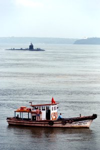 USS Santa Fe and fishing boat in Goa, India