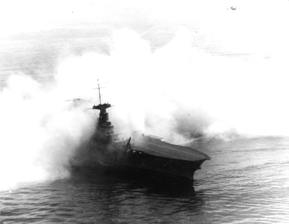 USS Saratoga (CV-3) shrouded by a smokescreen, circa 1930 (NH 94859)