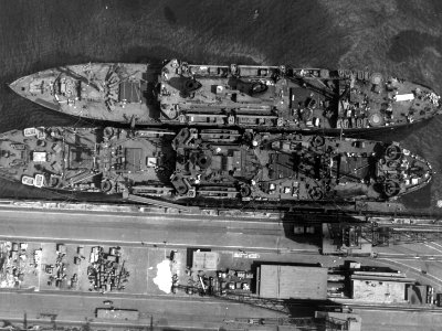 USS San Saba (APA-232) and USS Audrain (APA-59) in port, circa in 1945 (7574946)