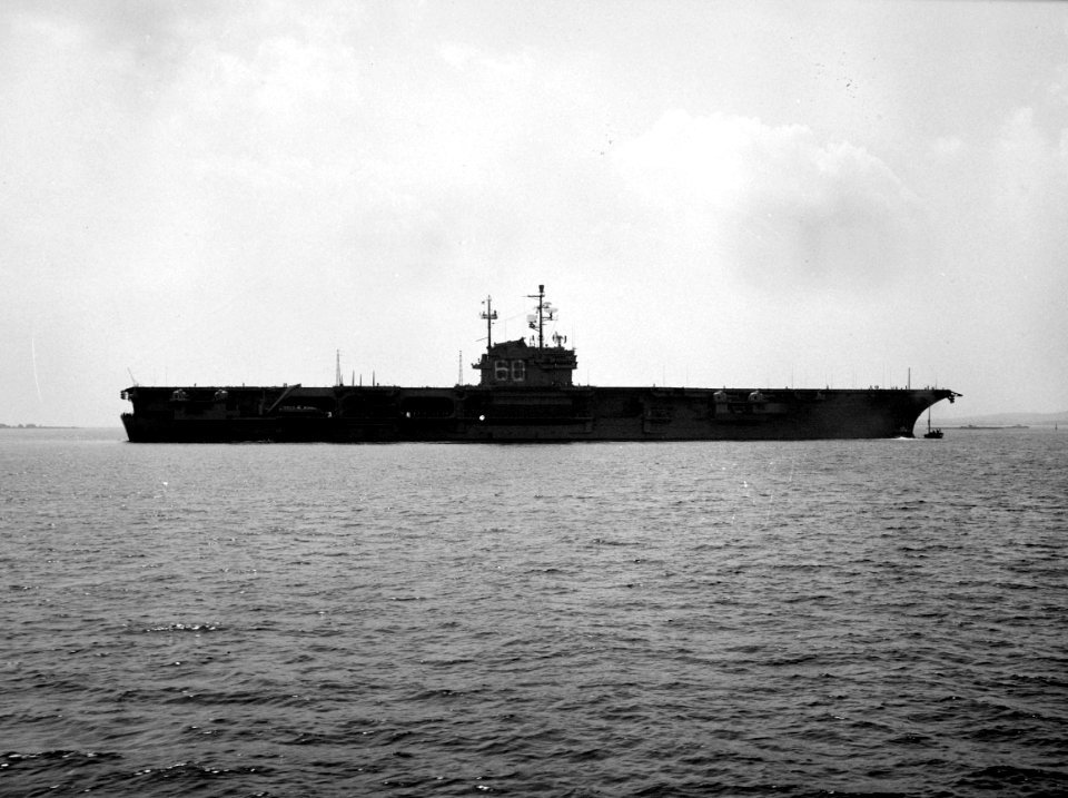 USS Saratoga (CVA-60) being pushed by a tug c1956