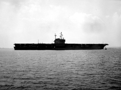 USS Saratoga (CVA-60) being pushed by a tug c1956