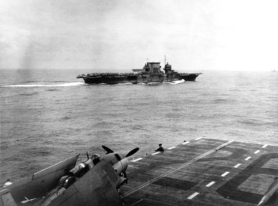 USS Saratoga (CV-3) and USS Monterey (CVL-26) underway in late 1943