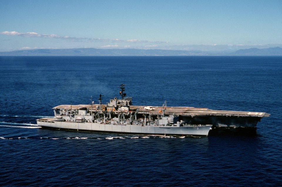 USS Seattle (AOE-3) and America (CV-66) underway in 1976