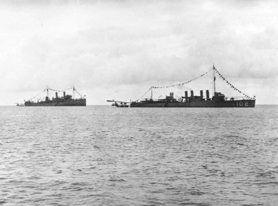 USS Shawmut (CM-4) and USS Mahan (DM-7) tending seaplanes, circa 1920 (NH 84411)