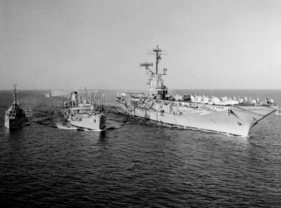 USS Shangri-La (CVA-38) and USS Purdy (DD-734) refueling from USS Allagash (AO-97) in the Mediterranean Sea on 26 April 1962