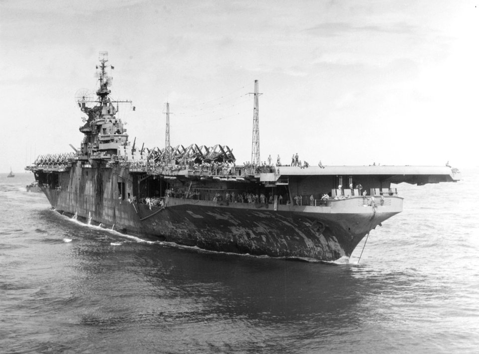 USS Shangri-La (CV-38) comes alongside USS Attu (CVE-102), 1945