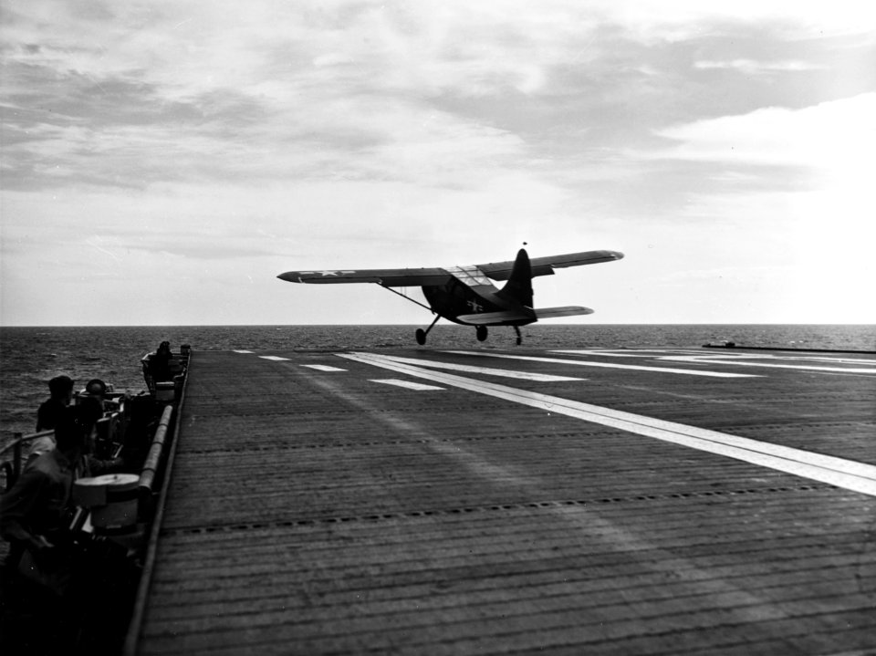 USS Sicily (CVE-118) launches OY-2 Sentinel off Korea on 22 September 1950 (80-G-420239)