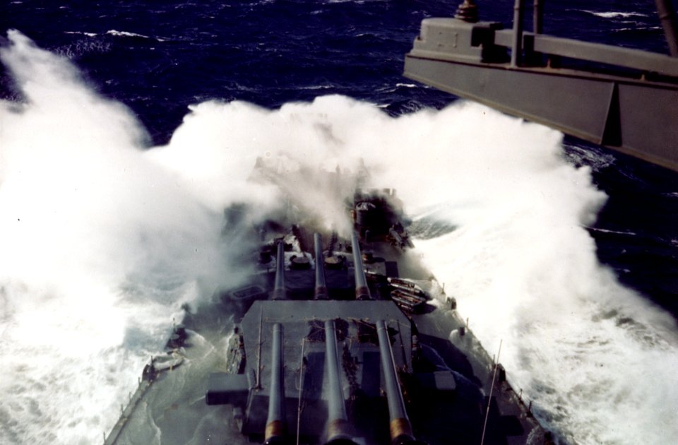 USS South Dakota (BB-57) steams into heavy seas on 24 February 1945 (80-G-K-3345)