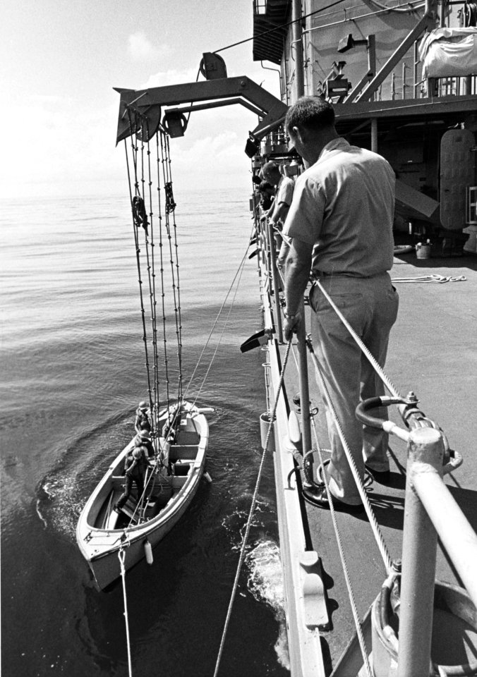 USS Spruance (DD-963) lowers a motor whaleboat, in 1975 (NH 96860)