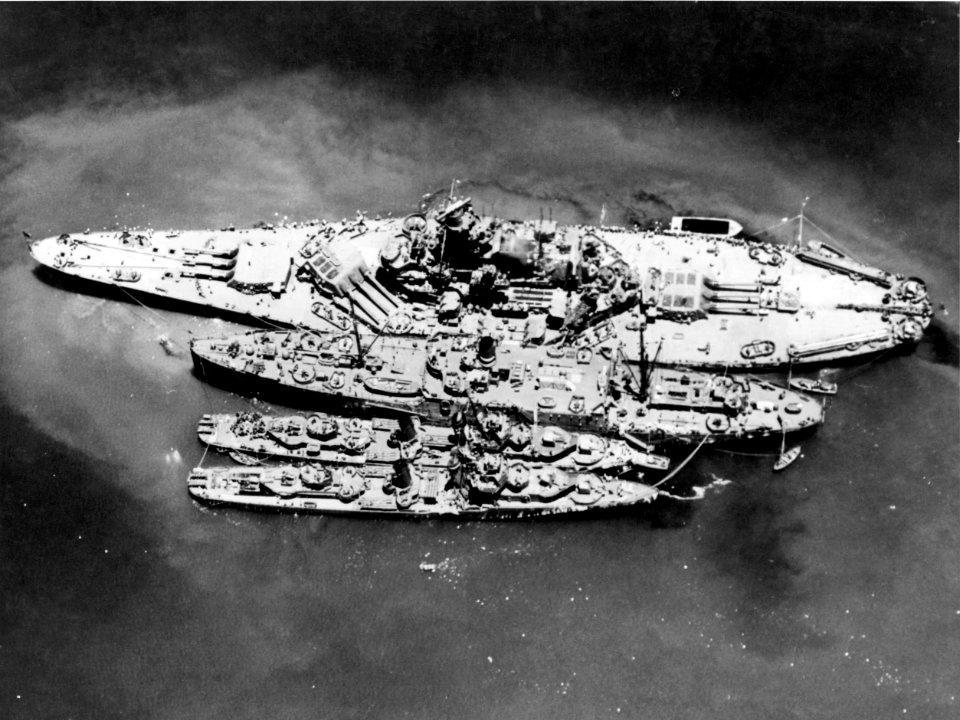 USS South Dakota (BB-57) and two destroyers alongside of USS Prometheus (AR-3), in November 1942 (80-G-36088)