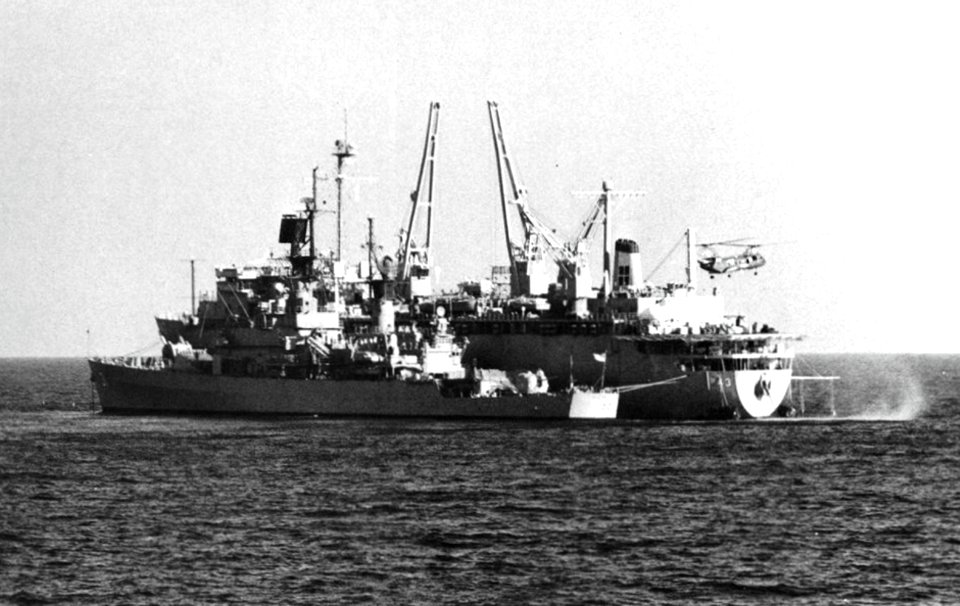 USS Sterett (CG-31) and USS Cape Cod (AD-43) at anchor off Masirah Island, Oman, in early 1988