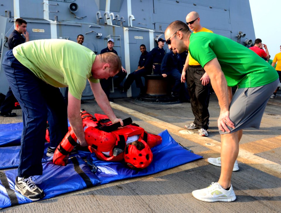 USS Sterett Sailors conduct OC spray qualifications 150105-N-GW139-070