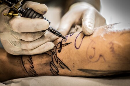 Tattoo tattoo artist arm photo
