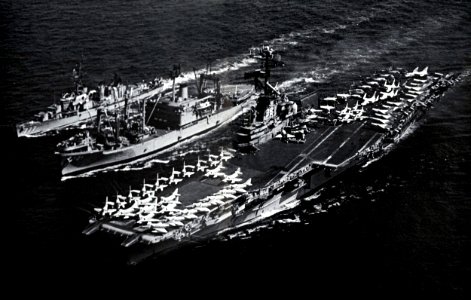 USS Suribachi (AE-21) replenishing USS Shangri-La (CVA-38) and USS Zellars (DD-777) in the Mediterranean Sea, in 1968