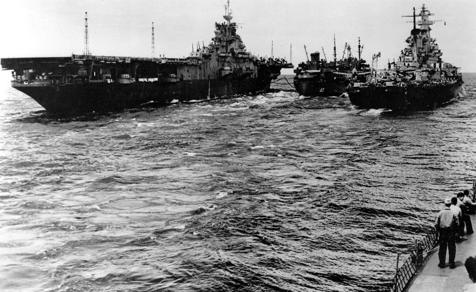 USS Tappahannock (AO-43) refuels USS Bon Homme Richard (CV-31) and USS Missouri (BB-63) in July 1945
