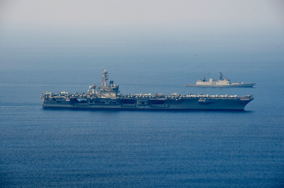 USS Theodore Roosevelt and INS Shivalik transit into formation during a photo exercise as a part of Exercise Malabar 2015