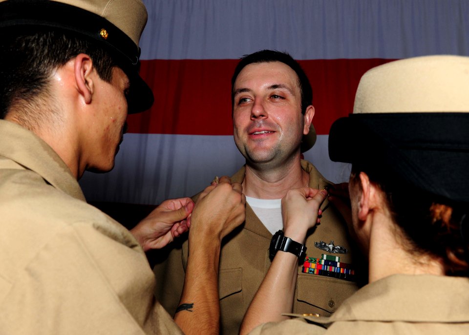 USS Theodore Roosevelt chief pinning ceremony 150915-N-PG340-020