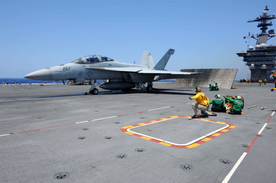 USS Theodore Roosevelt flight deck action 140605-N-OK726-135