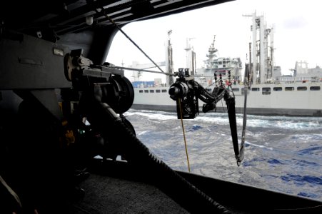 USS Theodore Roosevelt conducts a replenishment-at-sea exercise with INS Shakti