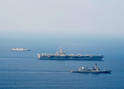 USS Theodore Roosevelt, JS Fuyuzuki and INS Shivalik transit into formation during a photo exercise as a part of Exercise Malabar 2015