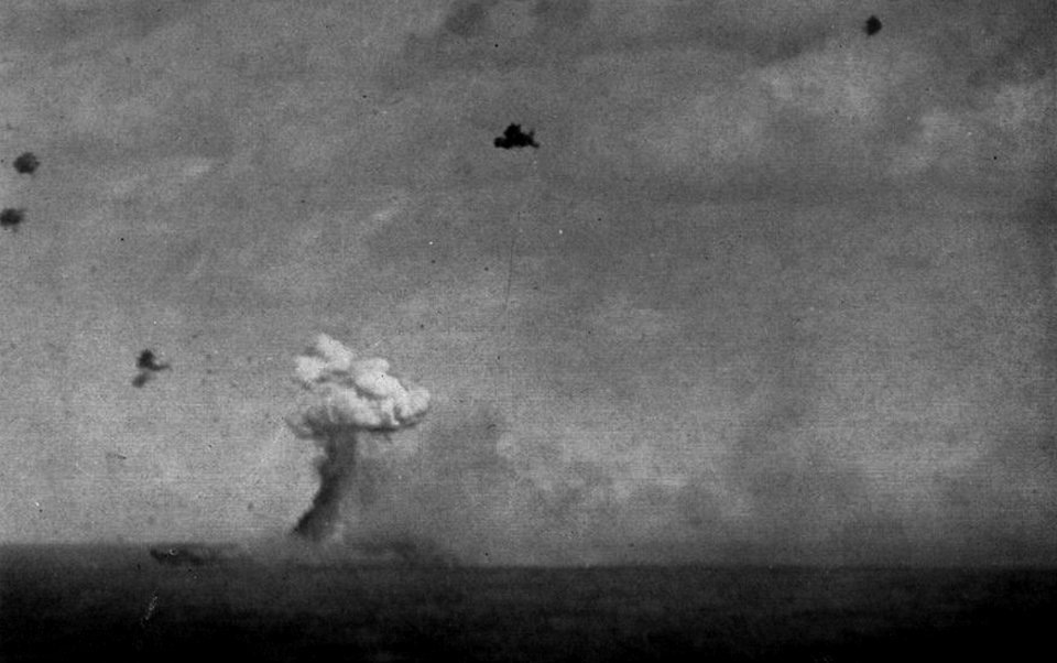 USS Ticonderoga (CV-14) is hit by a Japanese kamikaze on 21 January 1945