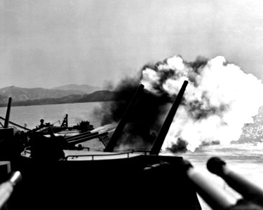 USS Toledo CA-133 firing salvo 1952