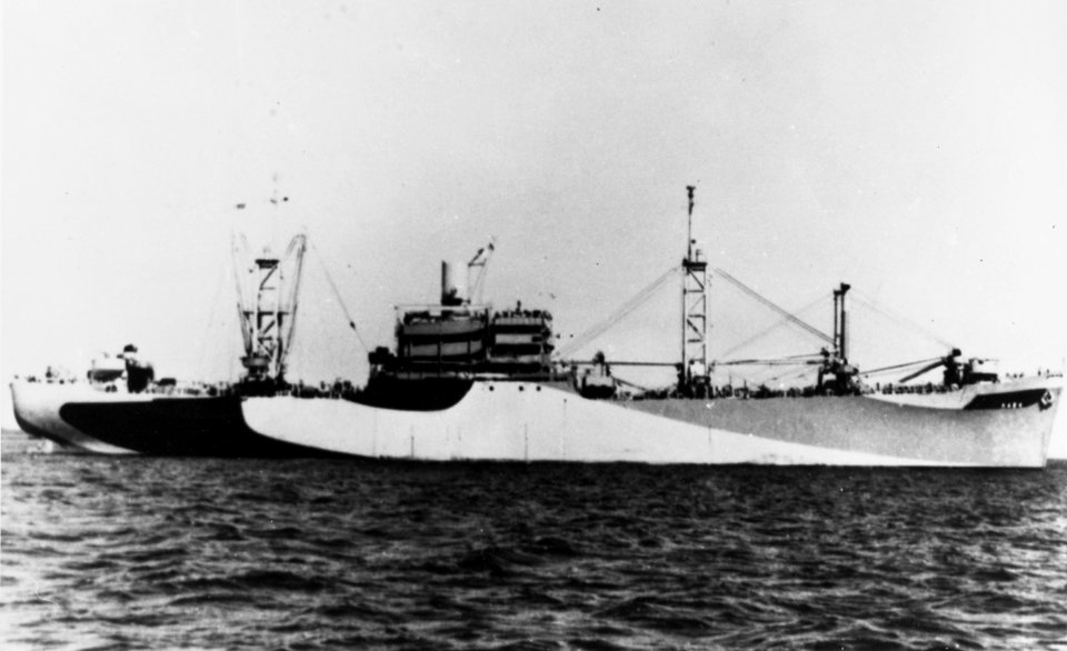 USS Tolland (AKA-64) underway, circa in September 1944 (NH 91137)